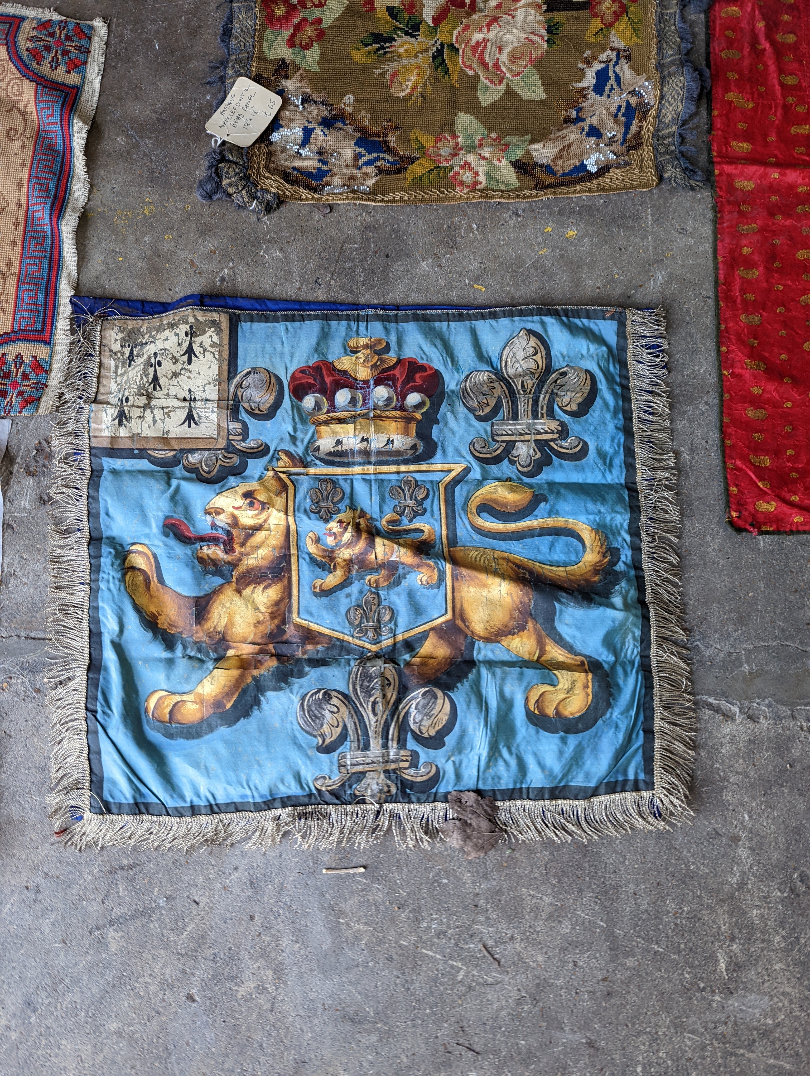 An Ottoman silk Koran cloth, three needle and bead work covers and assorted textiles